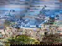 South America - Brazil, aerial view of Rio de Janeiro with Sugarloaf Mountain and the city's coastline. 