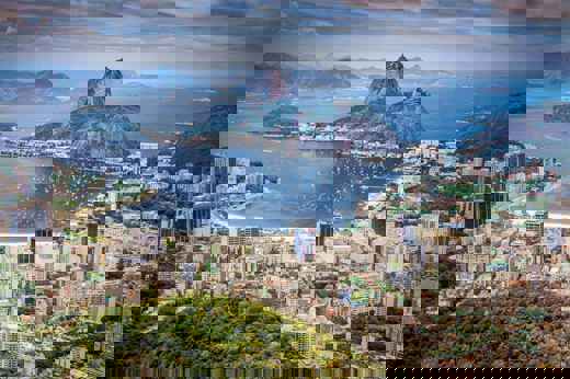 South America - Brazil, aerial view of Rio de Janeiro with Sugarloaf Mountain and the city's coastline. 