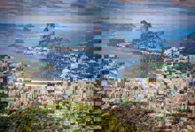 South America - Brazil, aerial view of Rio de Janeiro with Sugarloaf Mountain and the city's coastline.