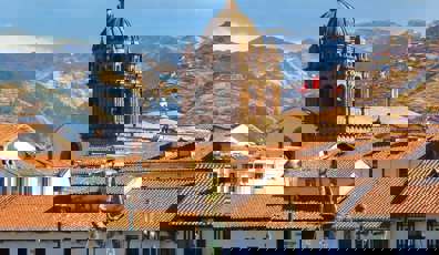Cusco's Plaza de Armas and cathedral sit beneath the Andes in Peru's historic capital. 