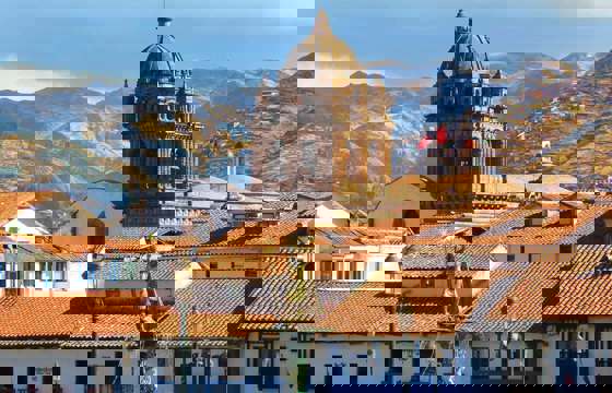 Cusco's Plaza de Armas and cathedral sit beneath the Andes in Peru's historic capital. 