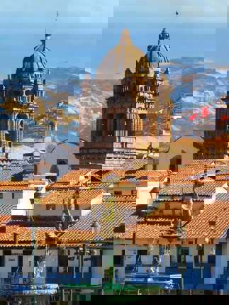 Cusco's Plaza de Armas and cathedral sit beneath the Andes in Peru's historic capital. 
