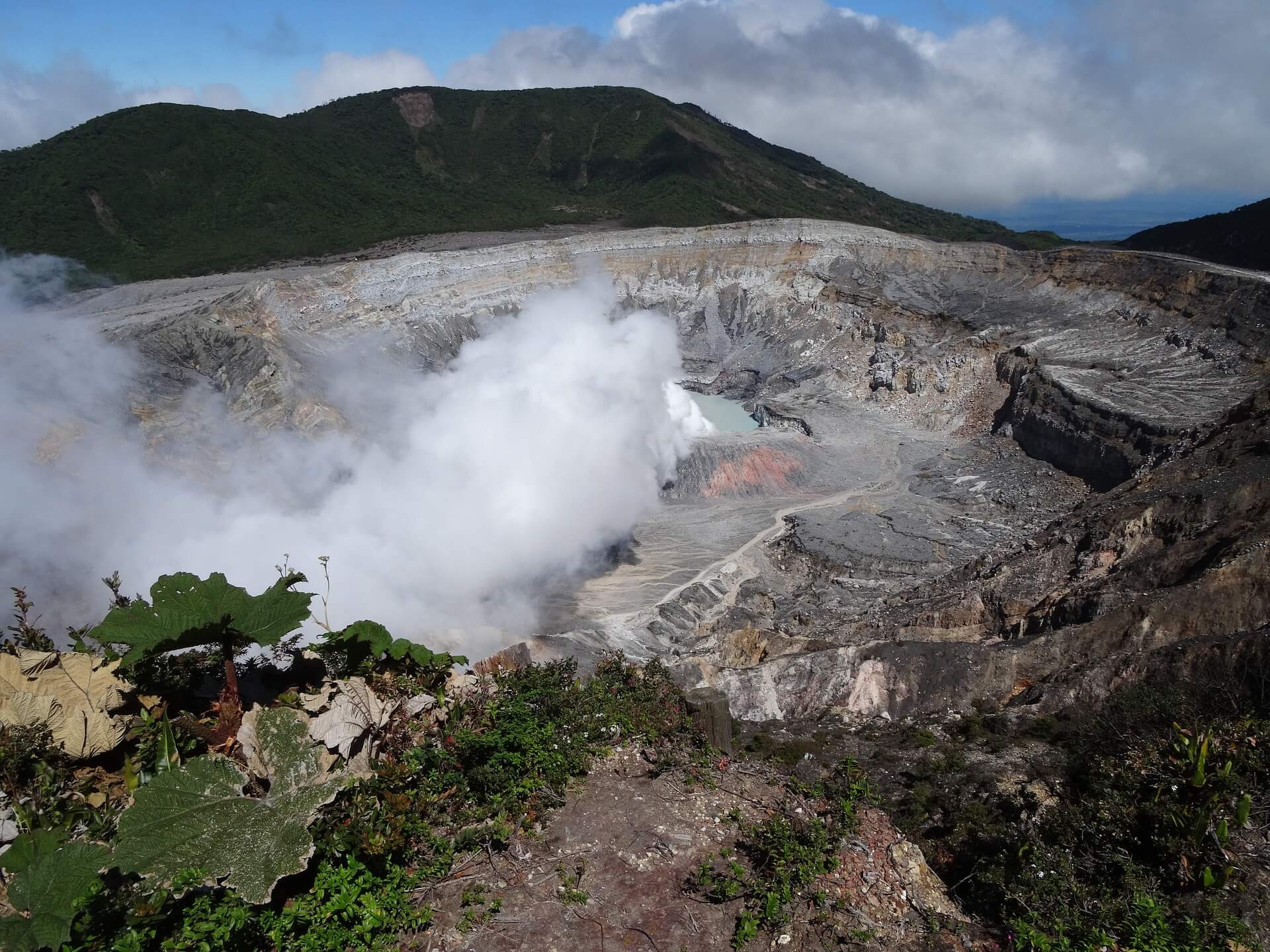 Steaming crater of Poas Volcano, a striking natural landmark near Alajuela. 