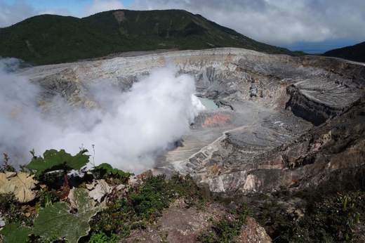 Steaming crater of Poas Volcano, a striking natural landmark near Alajuela. 