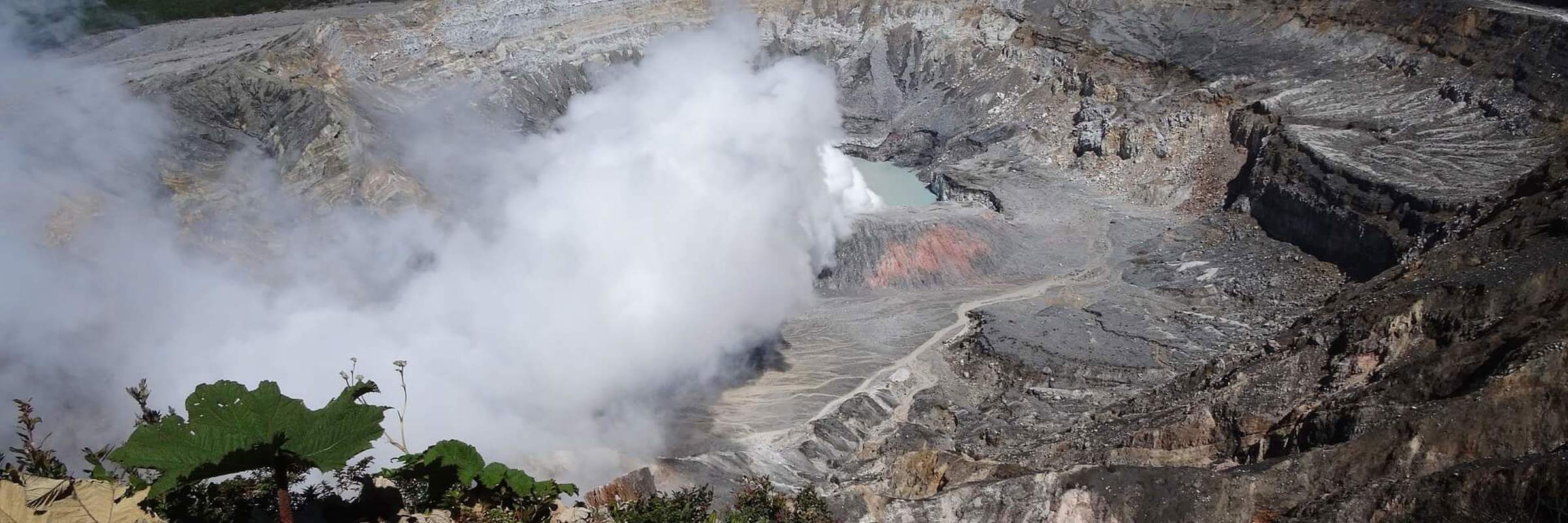 Steaming crater of Poas Volcano, a striking natural landmark near Alajuela. 