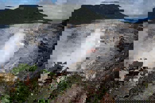 Steaming crater of Poas Volcano, a striking natural landmark near Alajuela. 