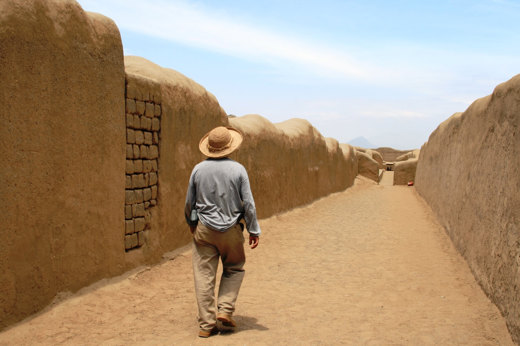 Exploring the ancient adobe walls of Chan Chan near Trujillo, Peru. 