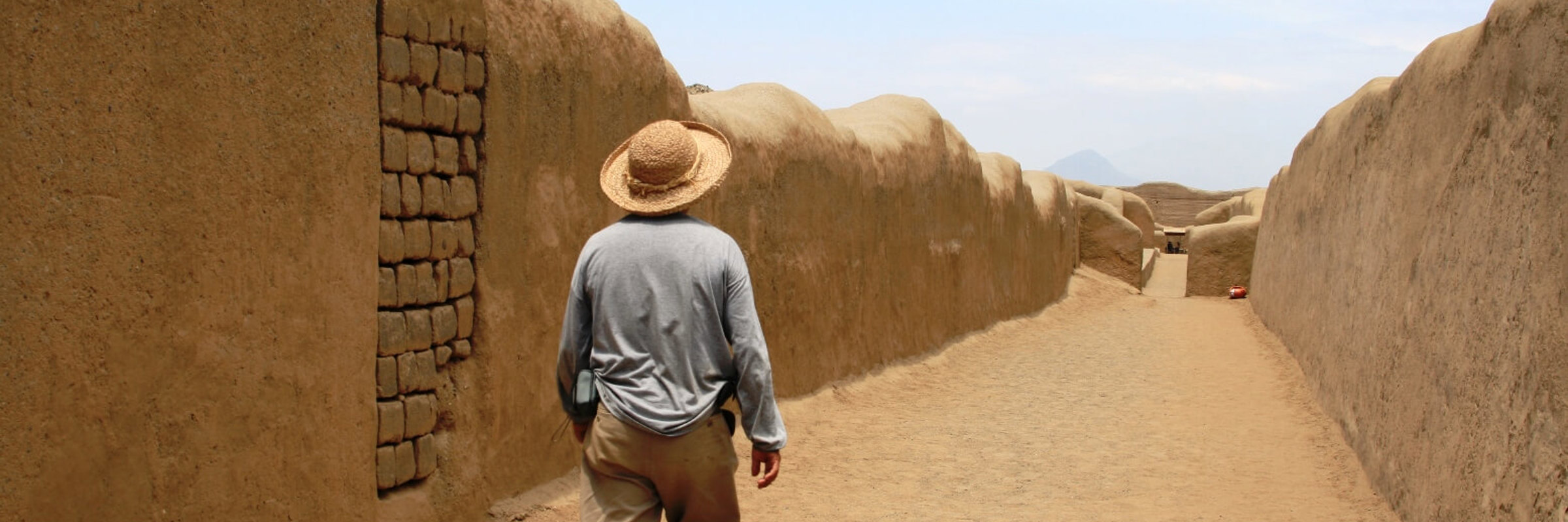Exploring the ancient adobe walls of Chan Chan near Trujillo, Peru. 