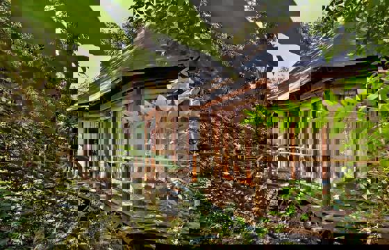 A secluded suite at Kasiiya Lodge blends luxury and nature, nestled in the heart of Costa Rica's tropical wilderness.