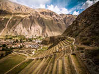 Ancient Inca terraces at Ollantaytambo archaeological site in Peru's Sacred Valley. 