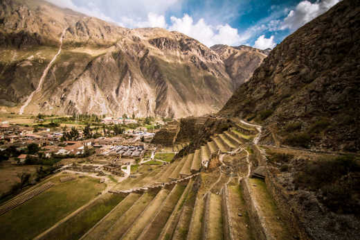 Ancient Inca terraces at Ollantaytambo archaeological site in Peru's Sacred Valley. 