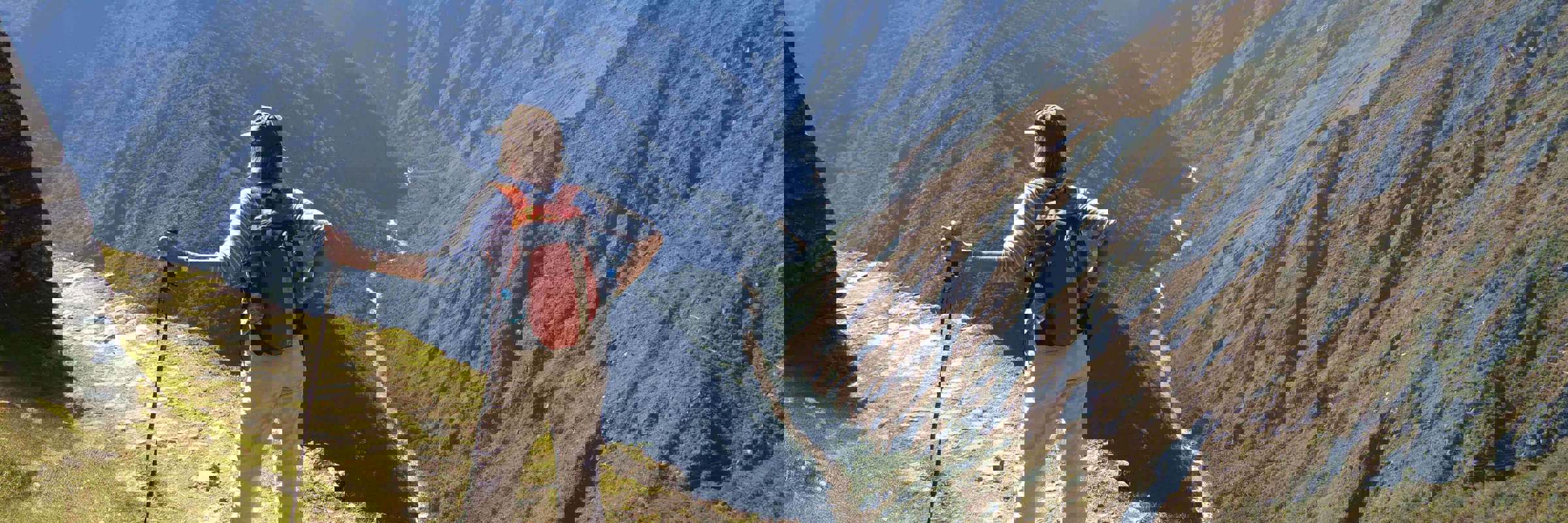 Hiker on the Inca overlooking Andes mountains near Machu Picchu, Peru adventure trek. 