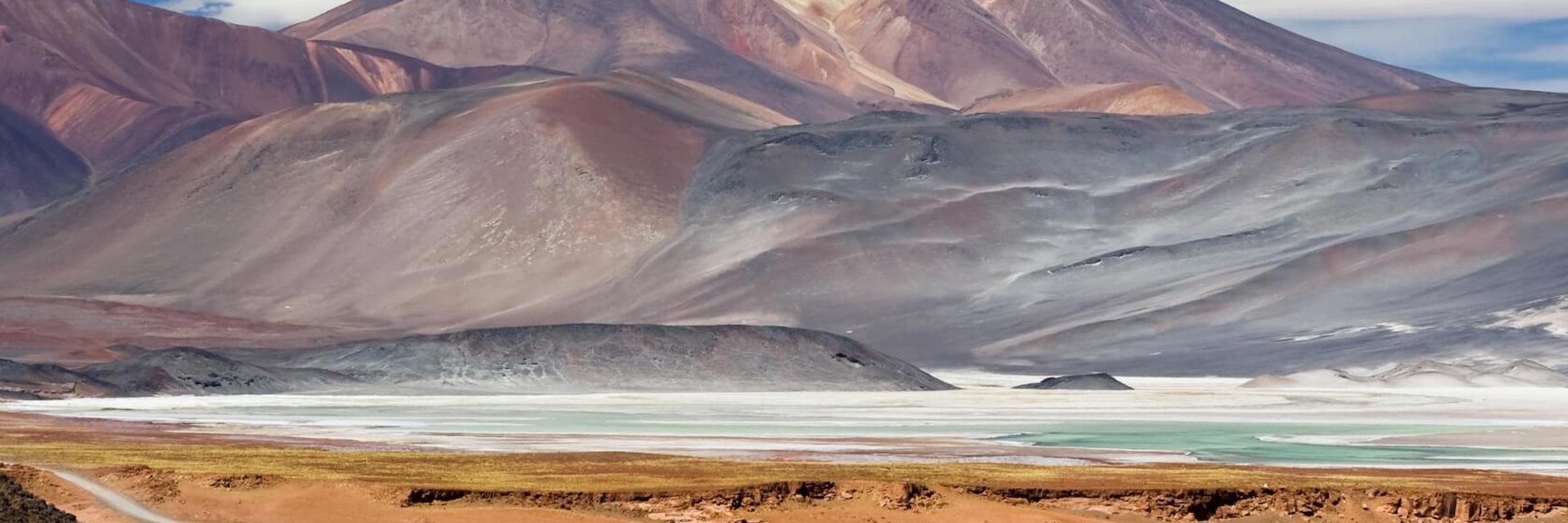 Multicolored mountains and salt flats in the Chilean Altiplano near San Pedro de Atacama. 