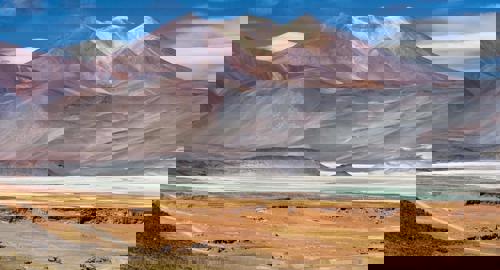 Multicolored mountains and salt flats in the Chilean Altiplano near San Pedro de Atacama.